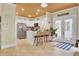 Bright kitchen with stainless steel appliances, counter seating, and wooden ceiling at 2021 Beckton St, North Charleston, SC 29420