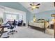 Large main bedroom with a king bed, sitting area, desk and vaulted ceilings at 2021 Beckton St, North Charleston, SC 29420
