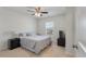 Cozy bedroom with a queen-sized bed, neutral decor, and ample natural light from the window at 210 Witch Hazel St, Summerville, SC 29486
