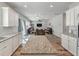 Open-concept kitchen overlooks living and dining areas, great for entertaining Gathering and friends at 210 Witch Hazel St, Summerville, SC 29486