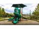 A neighborhood playground features a green slide and shade canopy at 211 W Bradford Pointe Dr Dr, Summerville, SC 29483