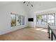 Bright bedroom features hardwood floors, a vaulted ceiling, and large windows with scenic views at 2138 Boatwright Rd, Johns Island, SC 29455