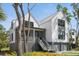 Beautiful two-story home with a modern design and inviting front porch at 2138 Boatwright Rd, Johns Island, SC 29455