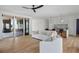 Open-concept living area featuring modern furnishings, hardwood flooring, and bright natural light at 2138 Boatwright Rd, Johns Island, SC 29455