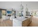 Open concept living space with modern kitchen island and elegant furnishings at 2138 Boatwright Rd, Johns Island, SC 29455