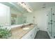 Elegant bathroom with a double vanity, granite countertops, and a glass-enclosed shower at 22 Fairhope Rd, Mount Pleasant, SC 29464