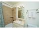 Functional bathroom with a shower-tub combo, and a single sink vanity with great lighting at 22 Fairhope Rd, Mount Pleasant, SC 29464