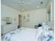 Charming bedroom showcasing a dresser, serene decor, and a comfortable sitting area at 22 Fairhope Rd, Mount Pleasant, SC 29464
