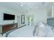 Primary bedroom with an ensuite bathroom, ceiling fan and access to the outside at 22 Fairhope Rd, Mount Pleasant, SC 29464
