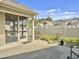 Relaxing patio space with mature plants and seating at 222 Stone Village Cir, Summerville, SC 29486