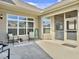 Inviting covered patio with comfortable seating and nice views at 222 Stone Village Cir, Summerville, SC 29486