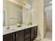 Elegant bathroom featuring double sinks and granite countertops at 222 Stone Village Cir, Summerville, SC 29486