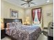 Cozy bedroom featuring a plush bed, soft lighting, and a window dressed with elegant curtains, creating a warm ambiance at 222 Stone Village Cir, Summerville, SC 29486