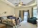 Comfortable bedroom featuring large windows, soft lighting, and neutral carpet at 222 Stone Village Cir, Summerville, SC 29486
