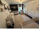 Lovely Bedroom featuring two cribs, neutral decor, and a large patterned area rug at 238 Howle Ave, Charleston, SC 29412