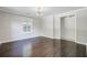 Bright bedroom with hardwood floors, neutral walls, a window, and modern ceiling fan at 238 Howle Ave, Charleston, SC 29412