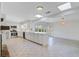 Spacious kitchen features stainless appliances, white cabinets, and an eat-in area with a large island at 238 Howle Ave, Charleston, SC 29412