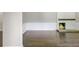 Spacious living room with a cozy fireplace, hardwood floors and white trim throughout at 238 Howle Ave, Charleston, SC 29412