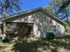 View of screened-in porch and yard with greenery at 241 Germantown Rd, Summerville, SC 29483