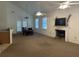 Spacious living area with vaulted ceilings, fireplace, and natural light at 241 Germantown Rd, Summerville, SC 29483