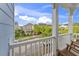 Charming view from a balcony showcasing neighborhood homes and a sunny sky at 245 Ribbon Rd, Summerville, SC 29483