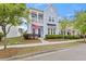 Charming two-story home featuring a balcony, light blue siding, manicured landscaping, and inviting curb appeal at 245 Ribbon Rd, Summerville, SC 29483