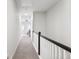 Hallway with carpet and white walls, leading to rooms with natural light at 245 Ribbon Rd, Summerville, SC 29483