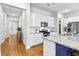 Bright kitchen featuring white cabinetry, stainless appliances, and a view into the entry hall at 245 Ribbon Rd, Summerville, SC 29483