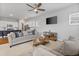 Open-concept living space connecting to a modern kitchen with stylish furniture and decor at 245 Ribbon Rd, Summerville, SC 29483