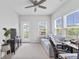 Bright living space with a sofa, desk, and TV, perfect for relaxation or work at 245 Ribbon Rd, Summerville, SC 29483