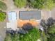Birds-eye view shows roof of a home, trees, and detached garage at 254 Nelson Farm Ln, Cross, SC 29436