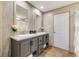 Bathroom features double sinks, modern fixtures, wood-look floors, and soft lighting at 254 Nelson Farm Ln, Cross, SC 29436