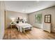 Cozy bedroom featuring a neutral color scheme, wood-look floors, and natural light from the window at 254 Nelson Farm Ln, Cross, SC 29436