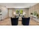 Bright living room with plenty of natural light, light wood floors, and stylish furniture at 254 Nelson Farm Ln, Cross, SC 29436