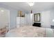 Comfortable bedroom with hardwood floors, natural light, and a vintage white dresser at 2766 Old Oak Walk, Seabrook Island, SC 29455