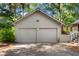 Detached two-car garage with a gabled roof and exterior lighting at 2766 Old Oak Walk, Seabrook Island, SC 29455