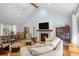 Bright and open floor plan with a fireplace and hardwood flooring at 2766 Old Oak Walk, Seabrook Island, SC 29455