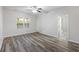 Comfortable bedroom with wood-look floors, natural light, and an ensuite bathroom for convenience at 278 Decatur Dr, Summerville, SC 29483