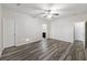 Serene bedroom with wood-look floors and an ensuite bathroom, perfect for relaxation and privacy at 278 Decatur Dr, Summerville, SC 29483