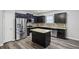 Well-appointed kitchen featuring granite countertops, stainless steel appliances, and an island at 278 Decatur Dr, Summerville, SC 29483