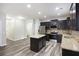 Contemporary kitchen with stainless steel appliances, dark wood cabinetry, and a central island at 278 Decatur Dr, Summerville, SC 29483