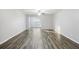 Bright living room with modern wood-look flooring, neutral paint, and a ceiling fan for comfort at 278 Decatur Dr, Summerville, SC 29483