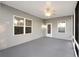 Relax on the screened porch with ceiling fan, providing an inviting space for unwinding and entertaining at 278 Decatur Dr, Summerville, SC 29483