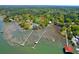Aerial view of coastal homes with private docks along a marshy waterway at 29 Morrison Ave, McClellanville, SC 29458
