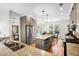 Well-designed kitchen with hardwood floors, a center island, stainless steel appliances, and ample cabinet space at 29 Morrison Ave, McClellanville, SC 29458