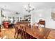 Open-concept living room featuring hardwood floors, natural light, and a view into the home's Gathering room at 29 Morrison Ave, McClellanville, SC 29458