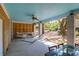 Covered patio featuring a hammock, concrete floors, and a ceiling fan for comfort and relaxation at 29 Morrison Ave, McClellanville, SC 29458