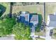 Aerial view showcases home with solar panels, a deck, and a spacious, fully fenced backyard at 2920 Newport Pl, North Charleston, SC 29420