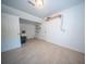 View of spacious basement area featuring neutral tile flooring and white walls, providing a blank canvas for customization at 2920 Newport Pl, North Charleston, SC 29420