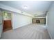 Spacious finished basement with a stone fireplace and neutral carpet at 2920 Newport Pl, North Charleston, SC 29420